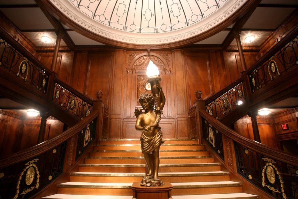 The iconic Titanic staircase at the Titanic: The Artifact exhibit in Las Vegas, one of the best things to do in Las Vegas with kids.
