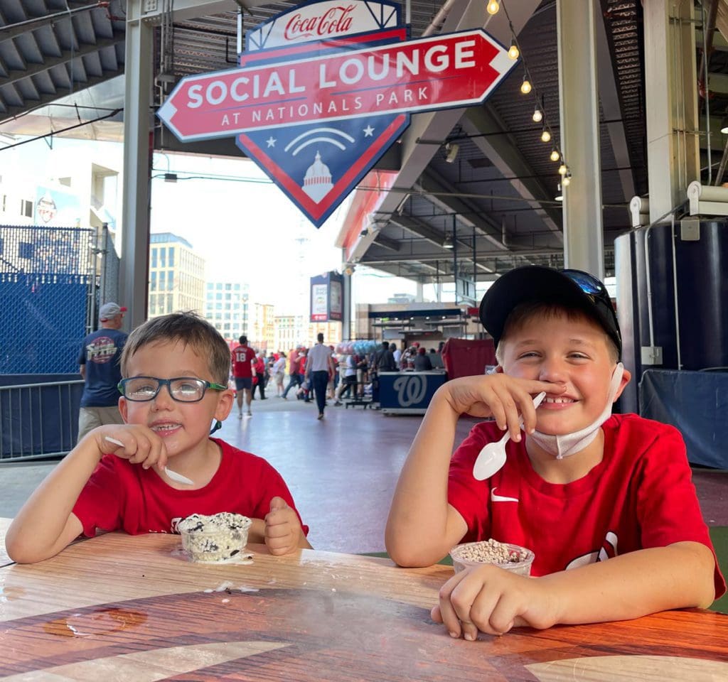 Two young boys eat ice cream at Navy Yard Ice Cream.