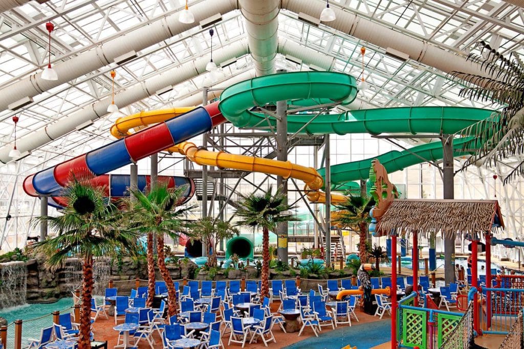 The water slides, splash areas, and pools of WaTiki Indoor Waterpark Resort.