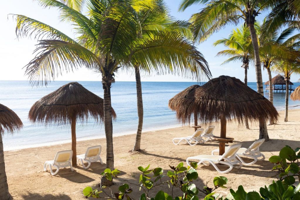 The beach at Hyatt Ziva Riviera Cancun, featuring oceanside loungers, cabanas, and gorgeous sandy shores.
