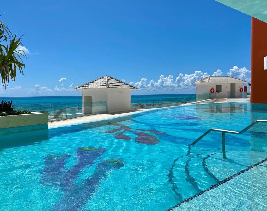 The infinity pool, with a view of the ocean, at Nickelodeon Hotels & Resorts Riviera Maya.