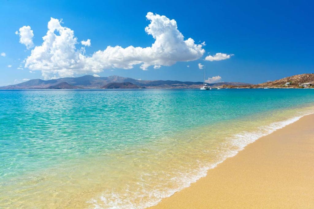 A picturesque beach in Naxos, with golden sands and pristine waters at one of the best Greek islands for families.