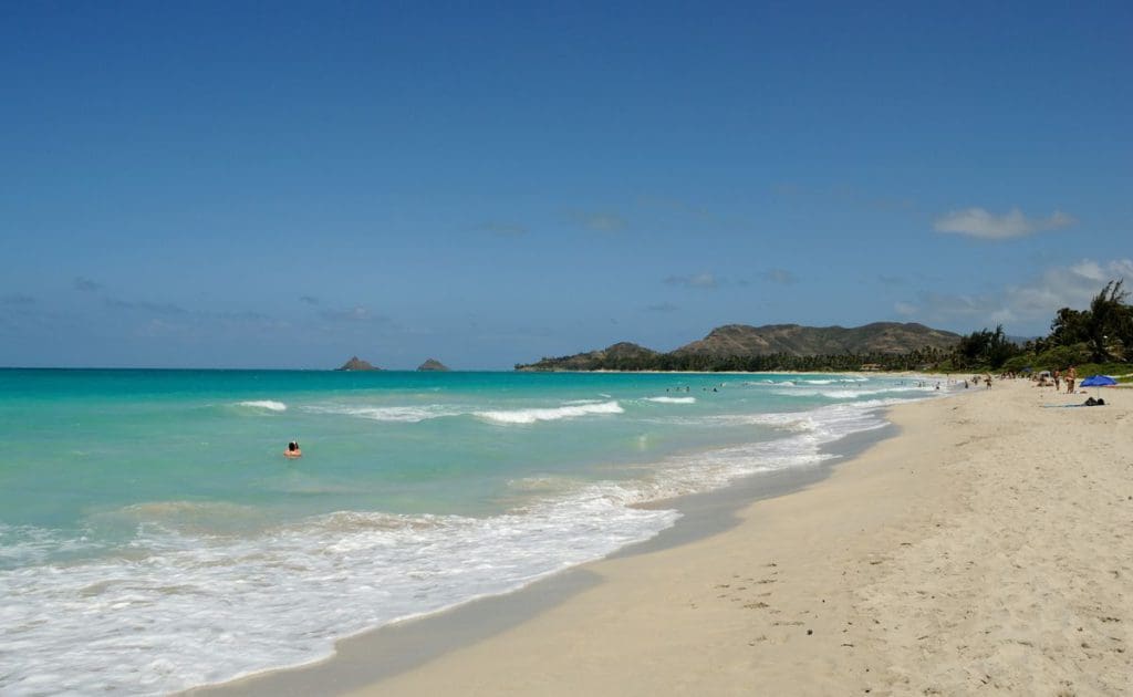 Someone snorkels in the ocean waters offshore from Kailua Bay.