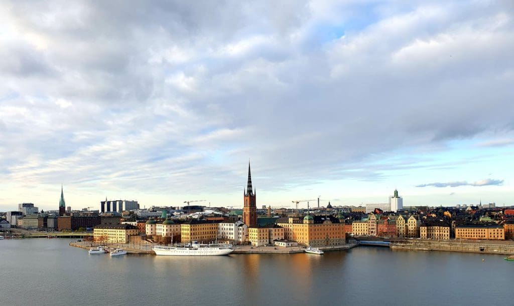 The skyline from Stockholm from across the water, one of the best mild weather European destinations for a family summer vacation.