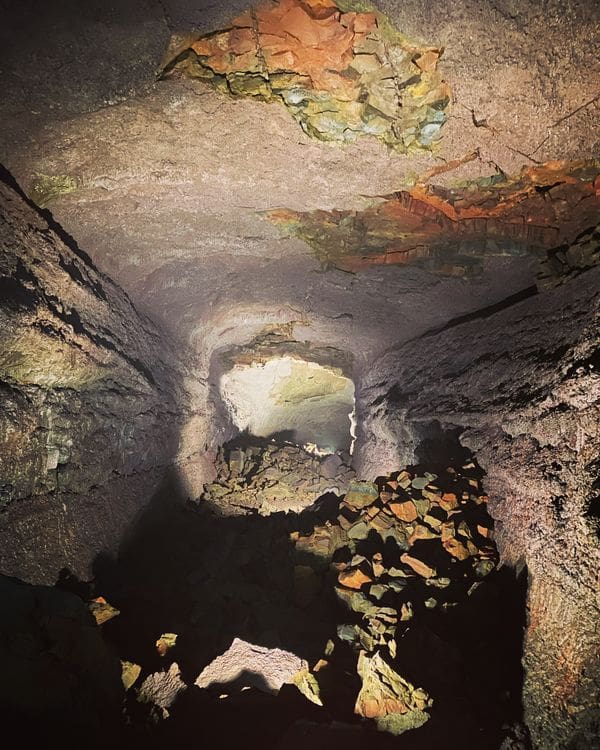 A natural window within the stone of a cave part of the Caves of Hella.