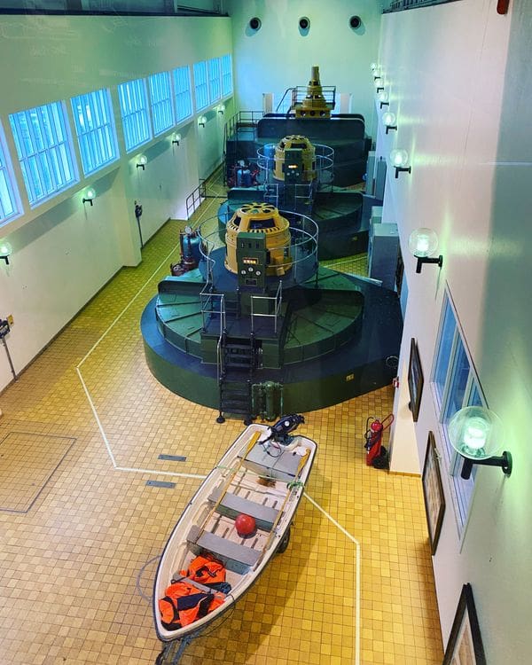 Several boats lined up inside the Húsavík Whale Museum.