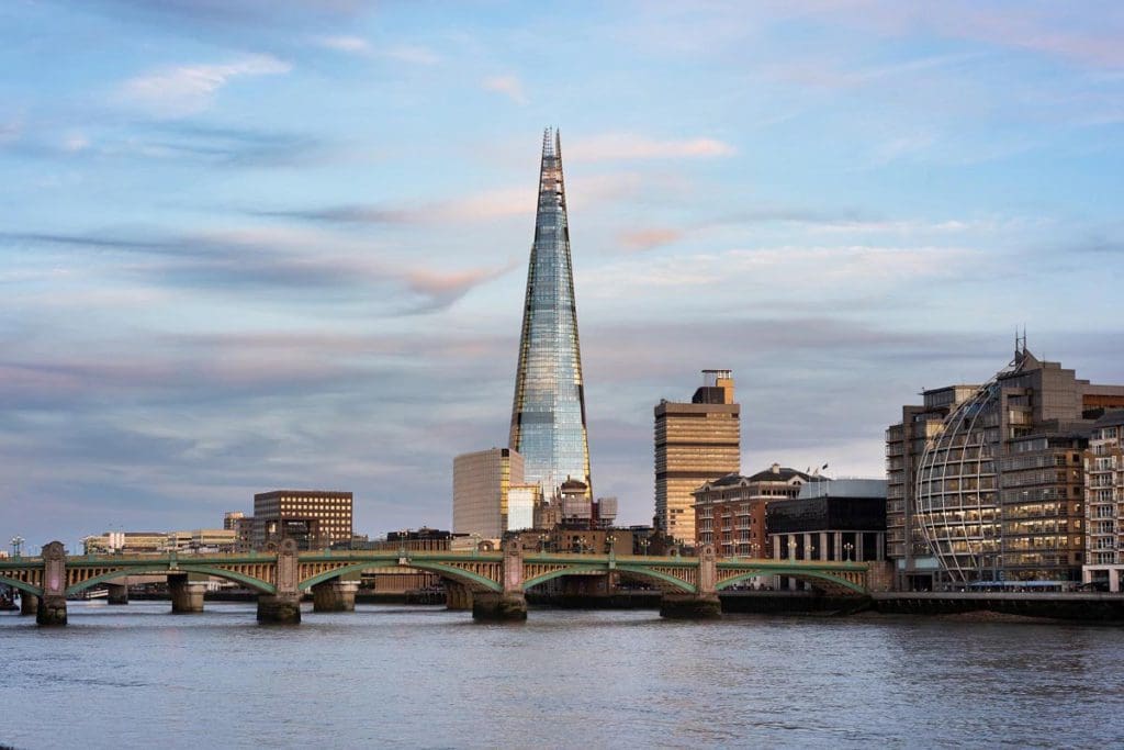 The Shangri La at the Shard among other buildings along the skyline of London across the river.