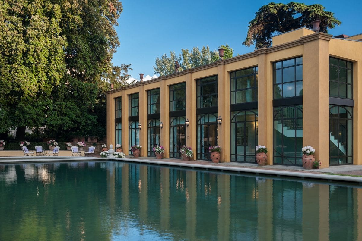 The outdoor pool flanking one side of the Four Seasons Hotel Firenze.