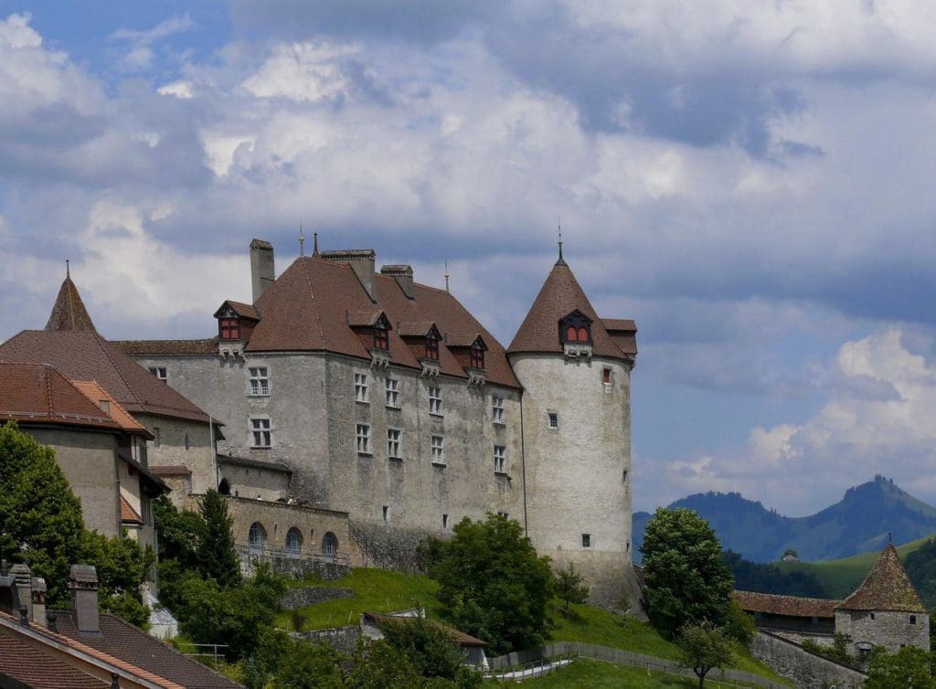 The iconic castle atop a hill in Gruyere, Switzerland.