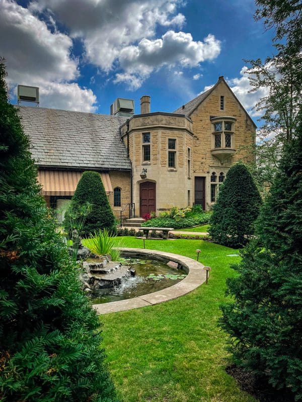 The exterior of the Bakken Museum from the interior gardens.