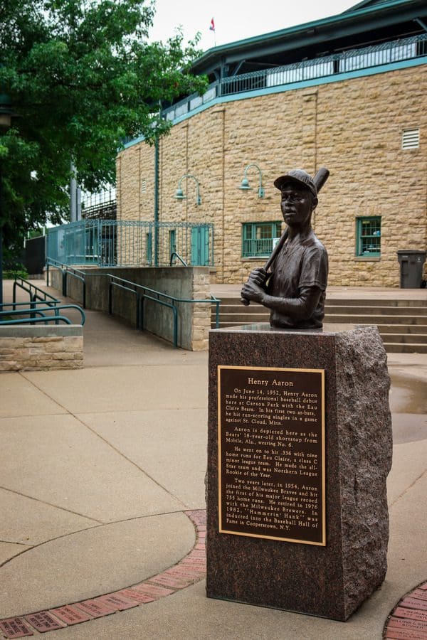 A statue of Hank Aaron with a placard in Carson Park.