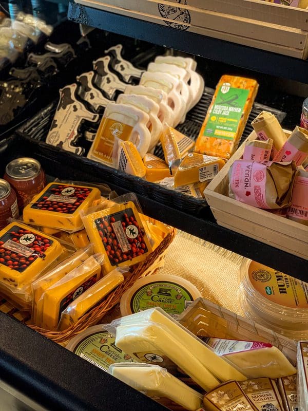 An cooler filled with Wisconsin-made cheeses for sale at The Local Store.