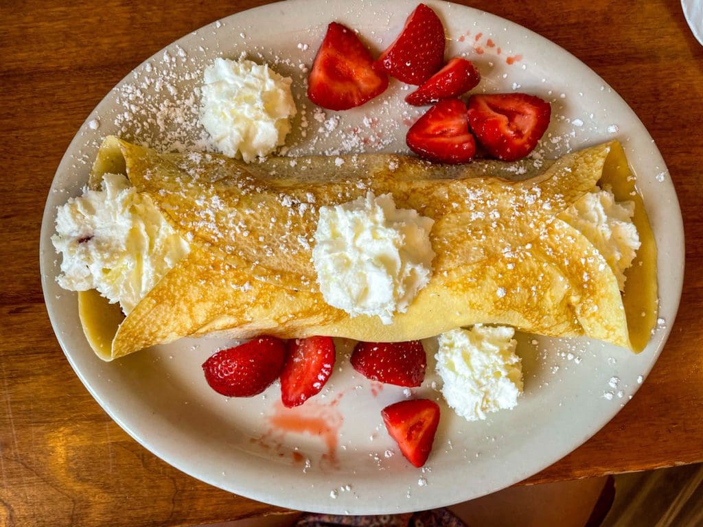 A large strawberry crepe with whipped cream from The Nucleus.
