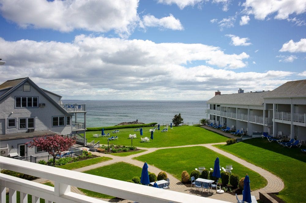 The lush lawn and landscaping at Beachmere Inn, facing the ocean coastline.