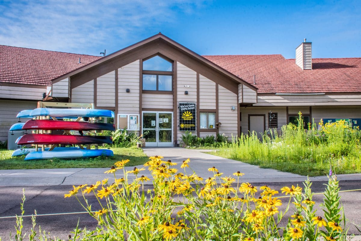 The entrance to the Nature Center at Beaver Creek Reserve on a sunny, summer day.