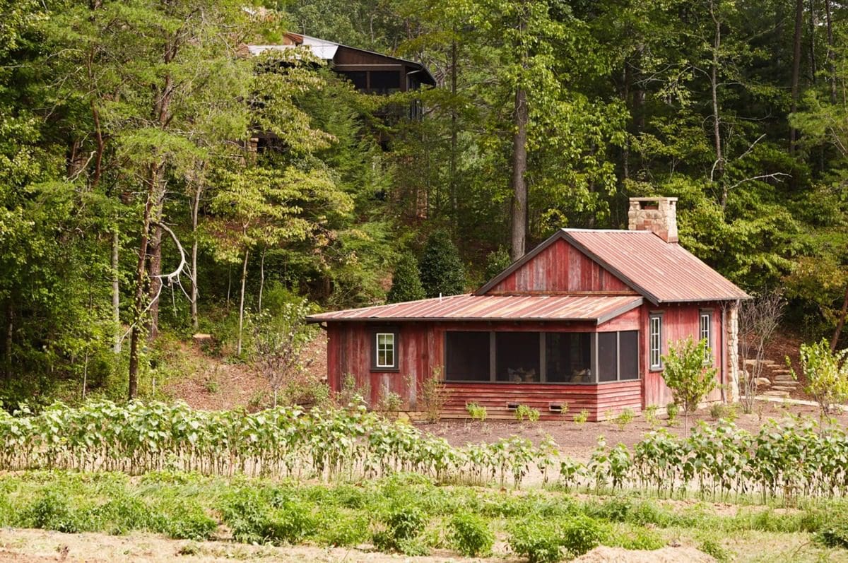 A rustic cabin tucked into the woods of Blackberry Farm.