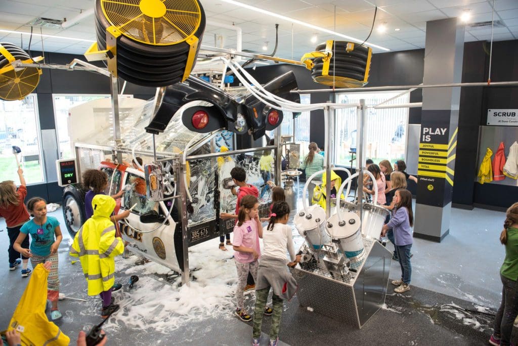 Several kids play and enjoy an exhibit at the Minnesota Children’s Museum, one of the best places to explore in the Twin Cities with kids.