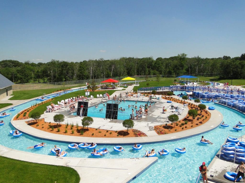 An aerial view of the Bunker Beach Water Park with surrounding lazy river on a sunny, summer day at one of the best places to explore near the Twin Cities with kids.