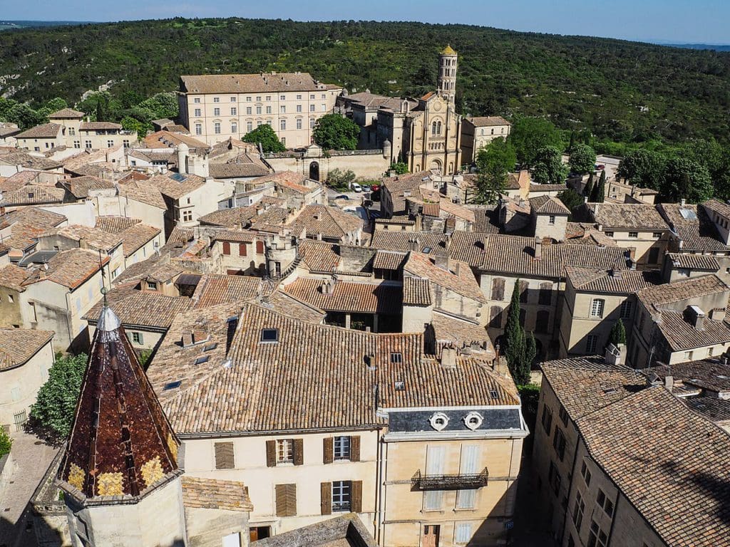 A view of the enchanting rooftops of Uzès, one of the best towns in the South of France with kids.