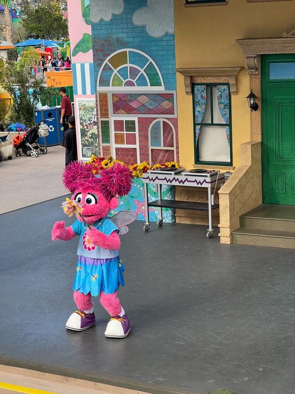 Sesame Street character, Zoe, dances on set at Sesame Place San Diego.