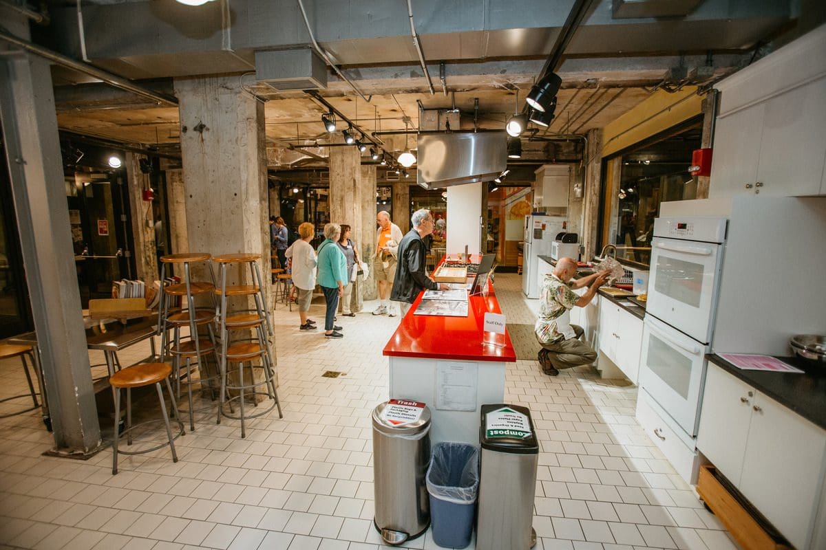 People wander around the Baking Lab at the Mill City Museum.