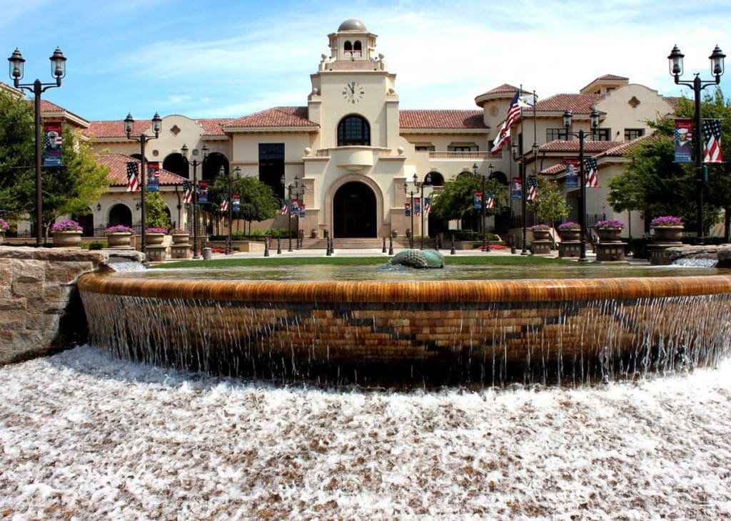 The front exterior of Temecula City Hall across from a lovely pond.