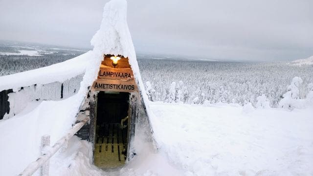 The entrance to the Lampivaara Amethyst Mine covered in the snow during winter.