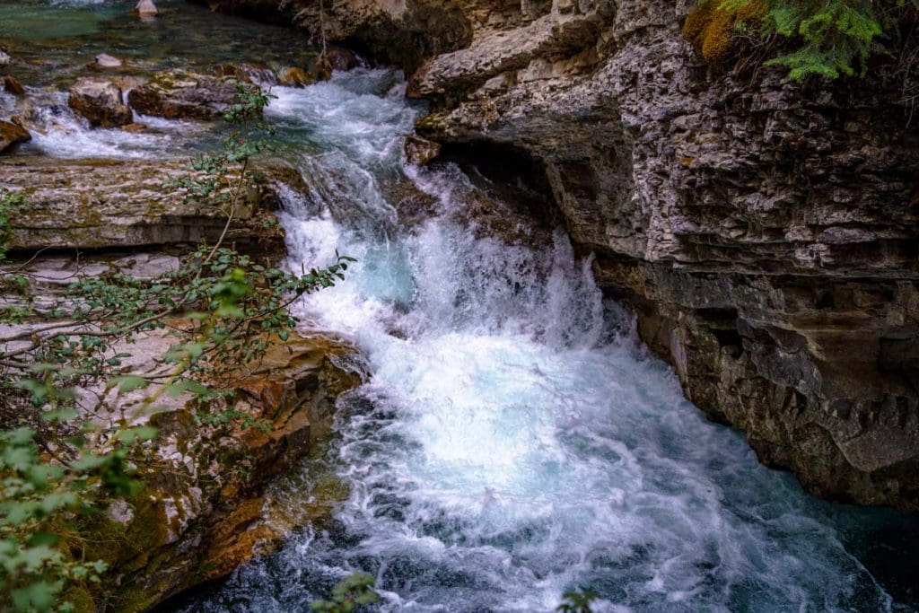 A river flowing through Johnston Canyon in the Canadian Rockies.