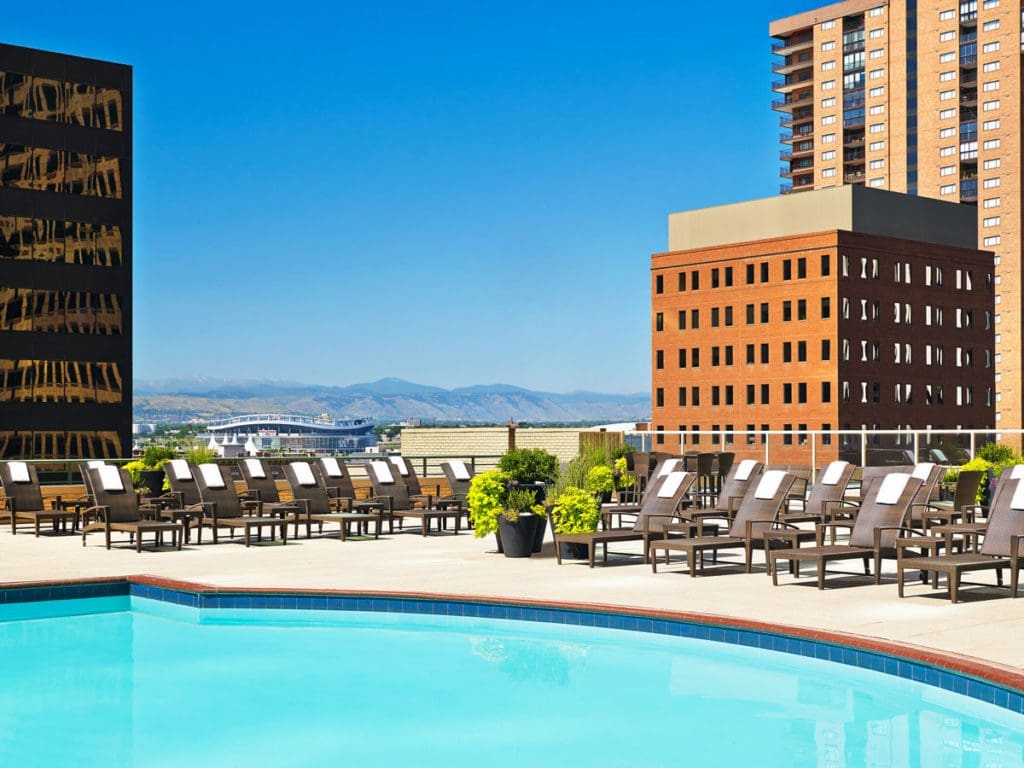 The outdoor, rooftop pool with a view of downtown Denver at The Westin Denver Downtown.
