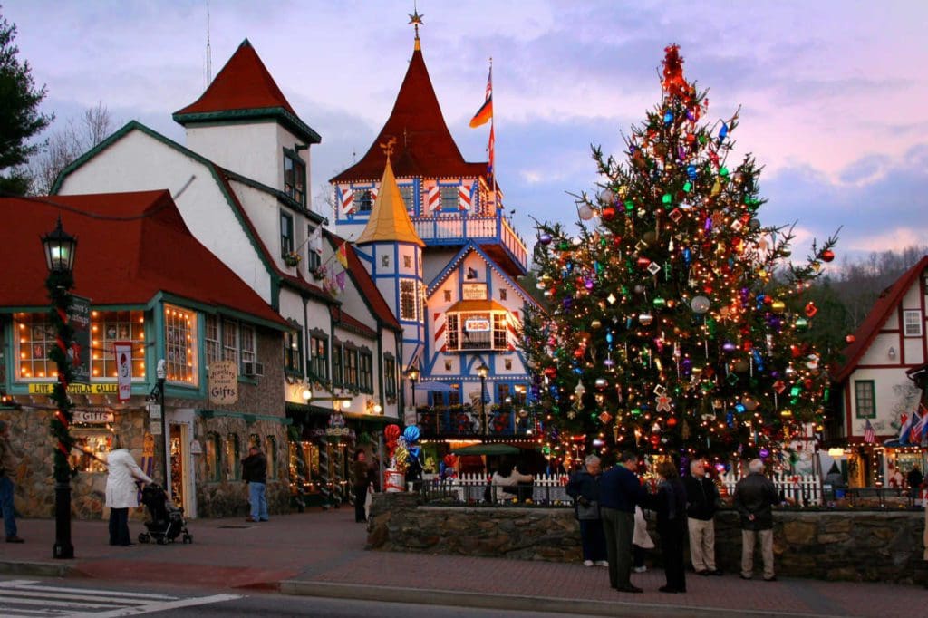 People explore the Christmas market in Helen, Georgia, one of the best christmas markets in the United States for families.