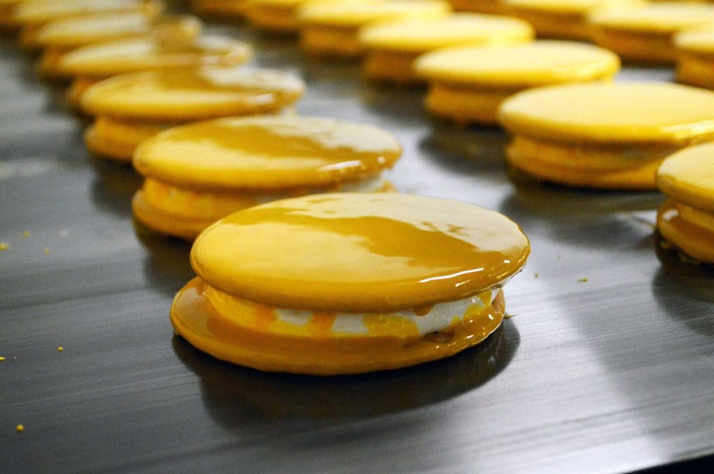 Several moon pies along a tray at Chattanooga Bakery.