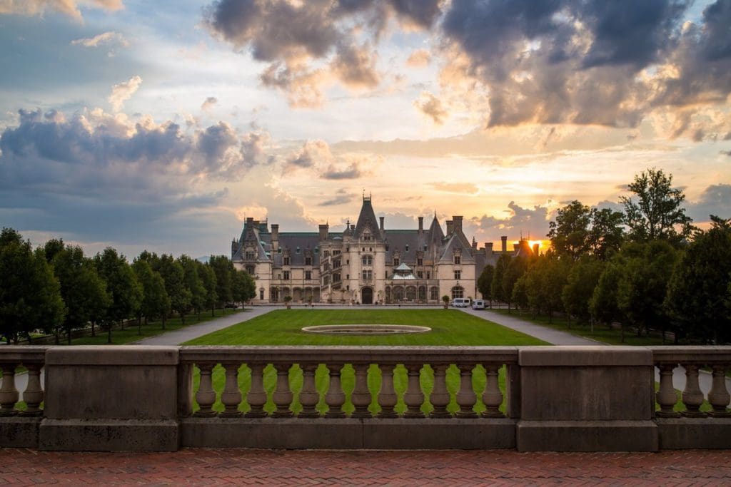A view of the Biltmore Estate house at dusk in Asheville, one of the best places to travel with your mom.