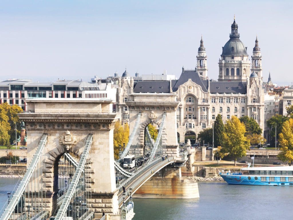 The Four Seasons Hotel Gresham Palace Budapest across the river in Budapest, Hungary.