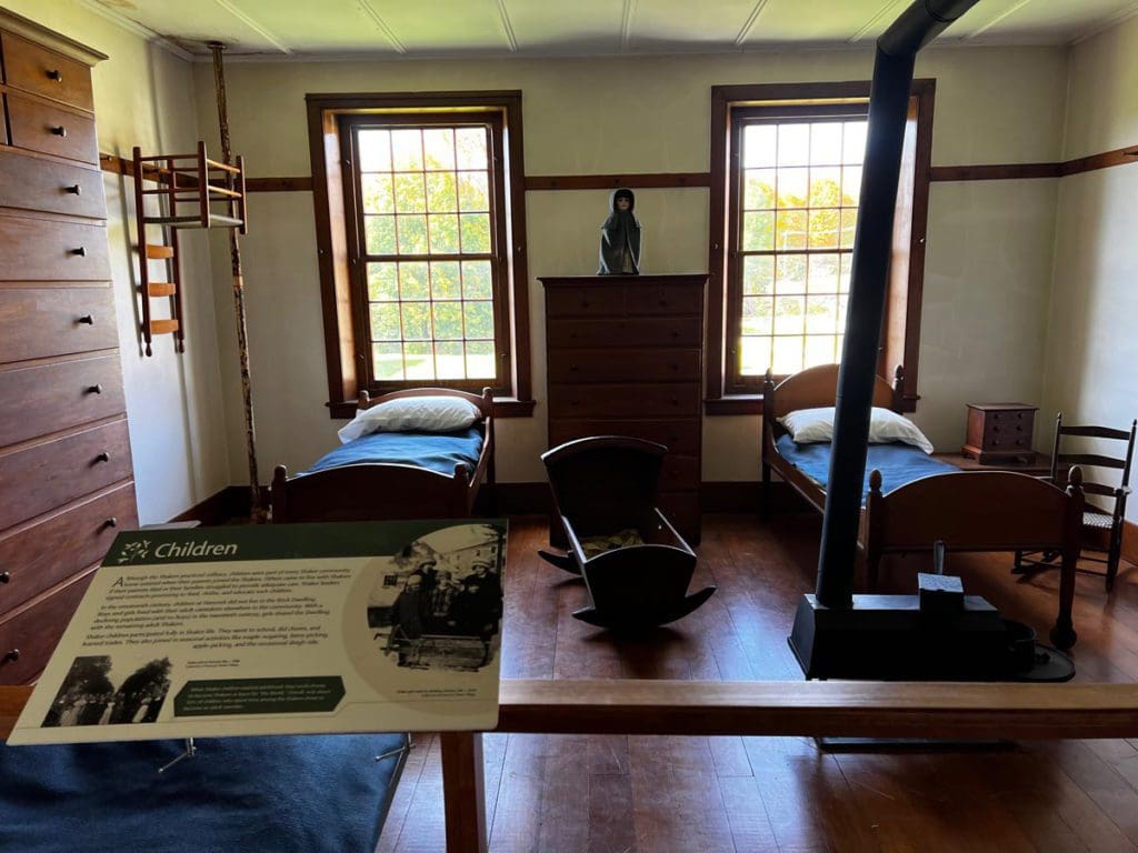 Inside an exhibit bedroom within the Hancock Shaker Village.