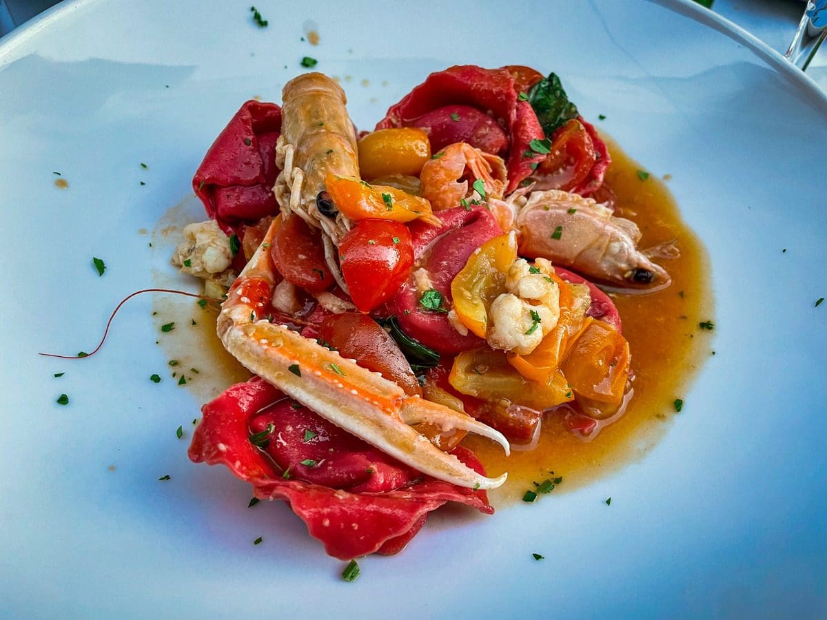 A langoustine rests atop a pasta dish in Monopoli.