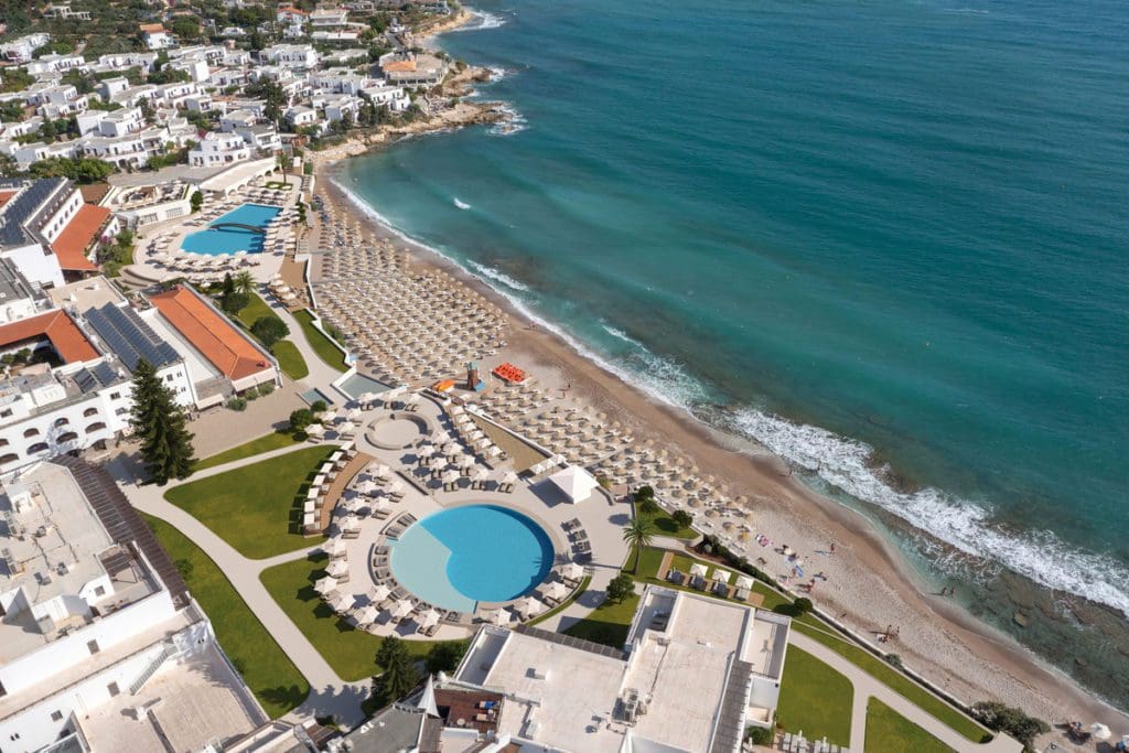 An aerial view of the beach and property of Creta Maris Resort, one of the best all-inclusive hotels in Greece for families.