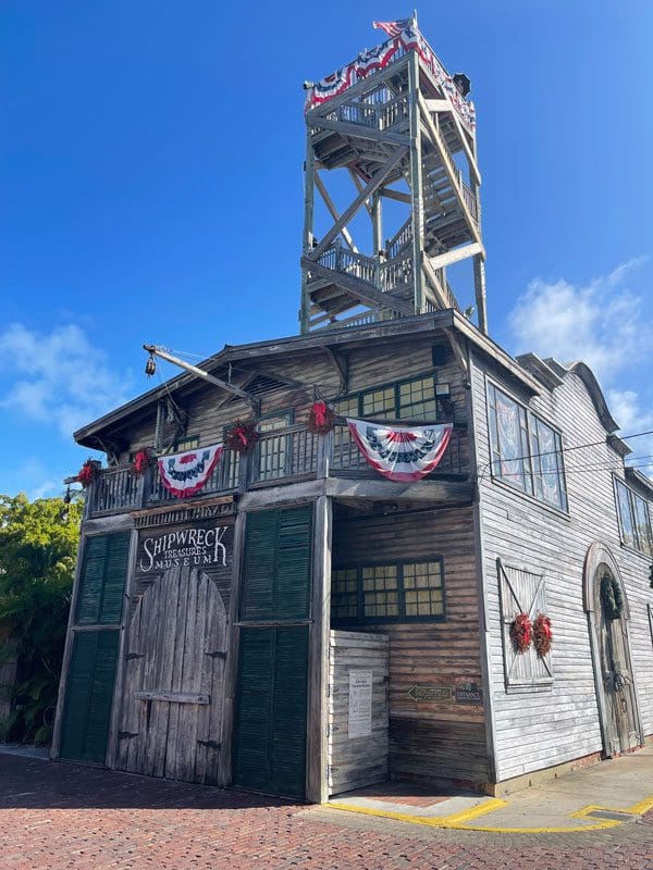 The exterior of the Shipwreck Museum in Key West on a sunny day.