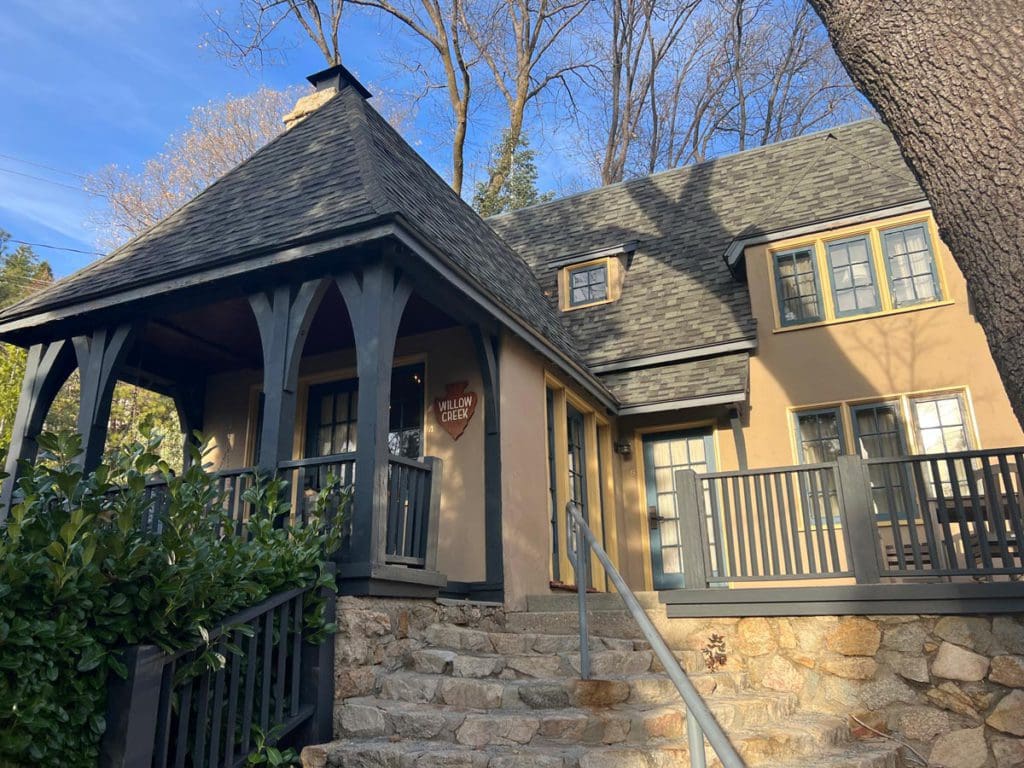 The entrance to one of the stone buildings at UCLA Arrowhead Lodge on a winter's day.