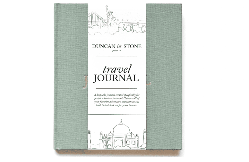 A product shot of a Duncan & Stone travel journal in sage green, travel journals are a great way to keep kids entertained while traveling.