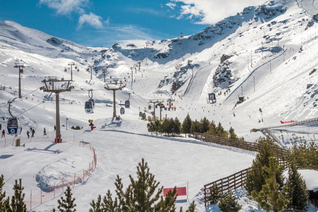 Ski slopes in the Sierra Nevada mountain range in Spain covered in snow during the winter. 