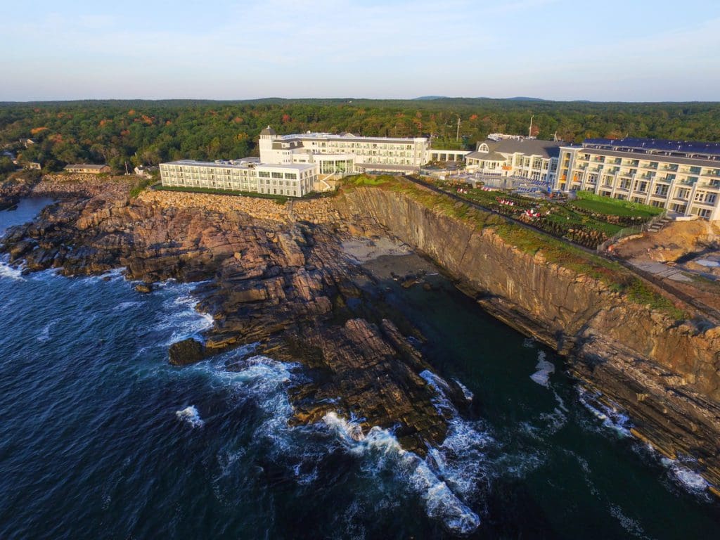 An aerial view of Cliff House Maine, nestled along a rocky cliff on the coast of Maine.