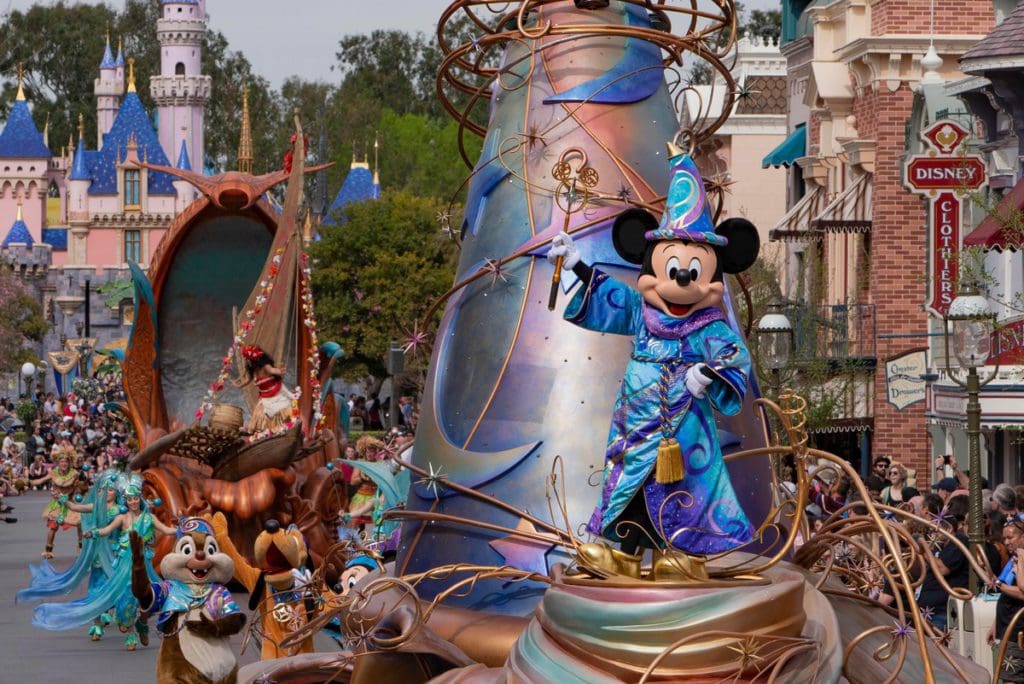 Mickey Mouse leads a parade through Disneyland.