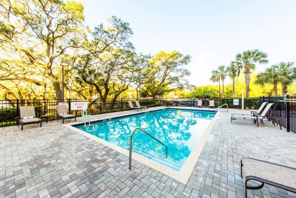 The cozy outdoor pool and pool deck at Hyatt Place Tampa/Busch Gardens, one of the best hotels in Tampa Bay for families.