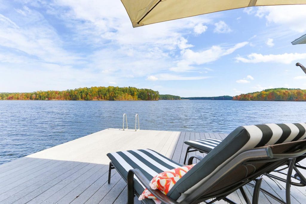 An empty chair rests on a dock on Hyco Lake, awaiting sometime to sit and take in the view.