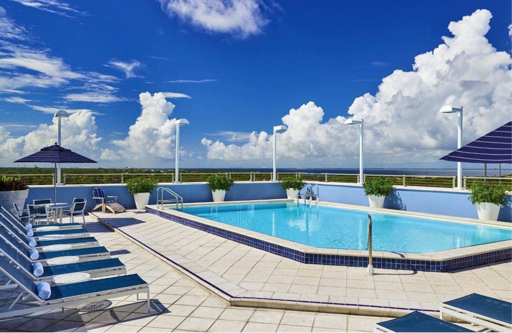 The outdoor pool at The Westshore Grand on a sunny day.