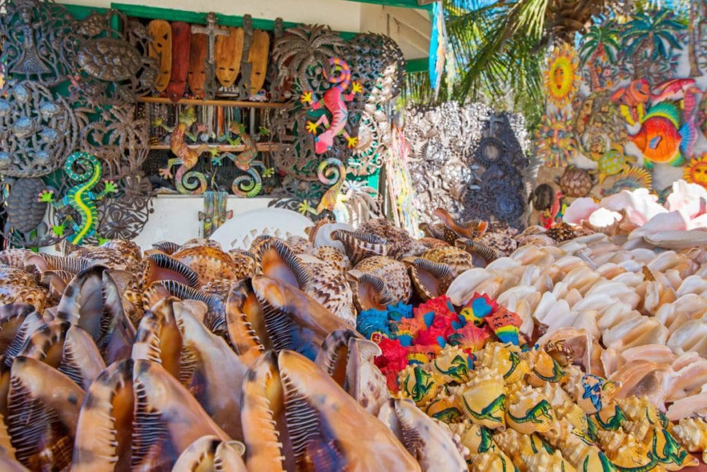 Different things to buy at Alverna’s Craft Market, including conch shells and other souvenirs.