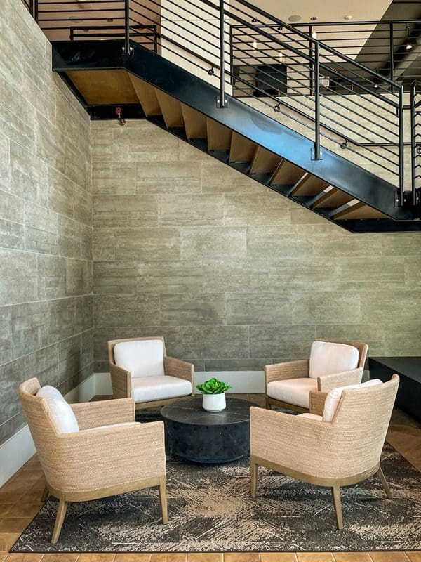 The spacious lobby seating area at AVE Tampa Riverwalk, one of the best hotels in Tampa Bay for families.