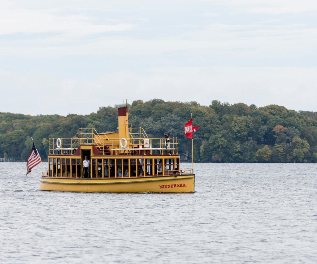 A lovely dinner cruise moves across Lake Minnetonka, one of the best lakes in Minnesota for families.