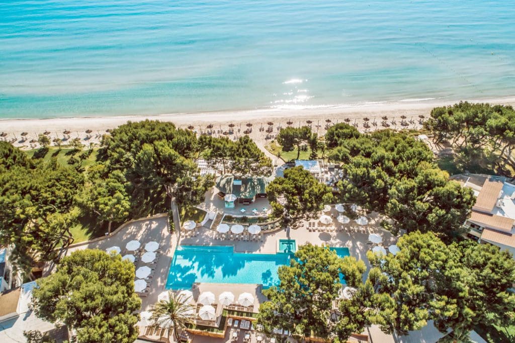 An aerial view of the beachfront property of Iberostar® Selection Playa de Muro, one of the best all-inclusive hotels in Mallorca for families.