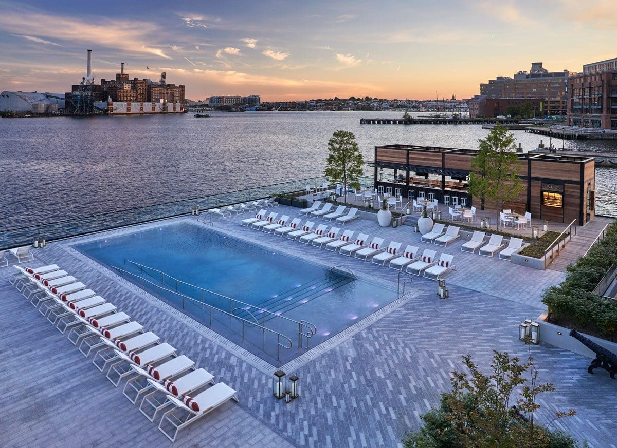 The waterfront pool at Sagamore Pendry at dusk, one of the best moms spa getaways near DC.